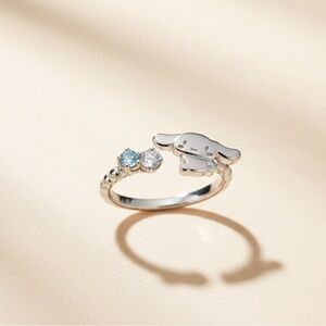 Silver Character Ring with Blue and Clear Stones